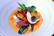Grilled sea bass, scallop and summer vegetable with creamy tomato sauce