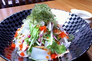 Chopped vegetable, sea grapes and sea vegetables salad