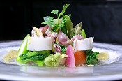 Various squids and seasonable vegetable salad with mustard taste